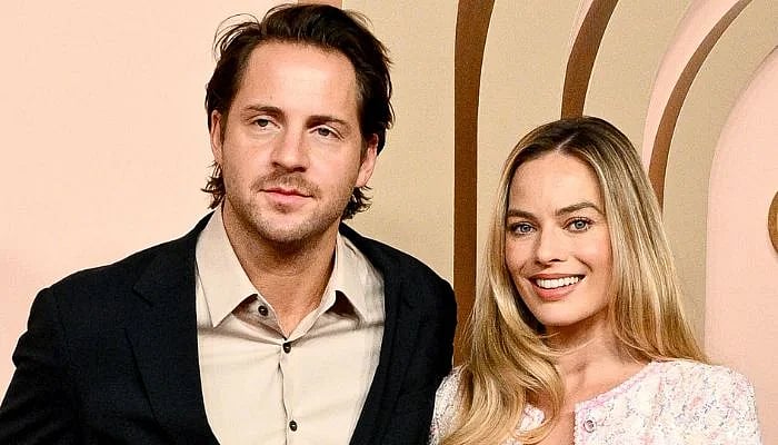 X : Margot Robbie with her husband, Tom Ackerley